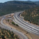 Aerial view of a highway winding through the hills of Küçükkuyu, Çanakkale, Turkey.