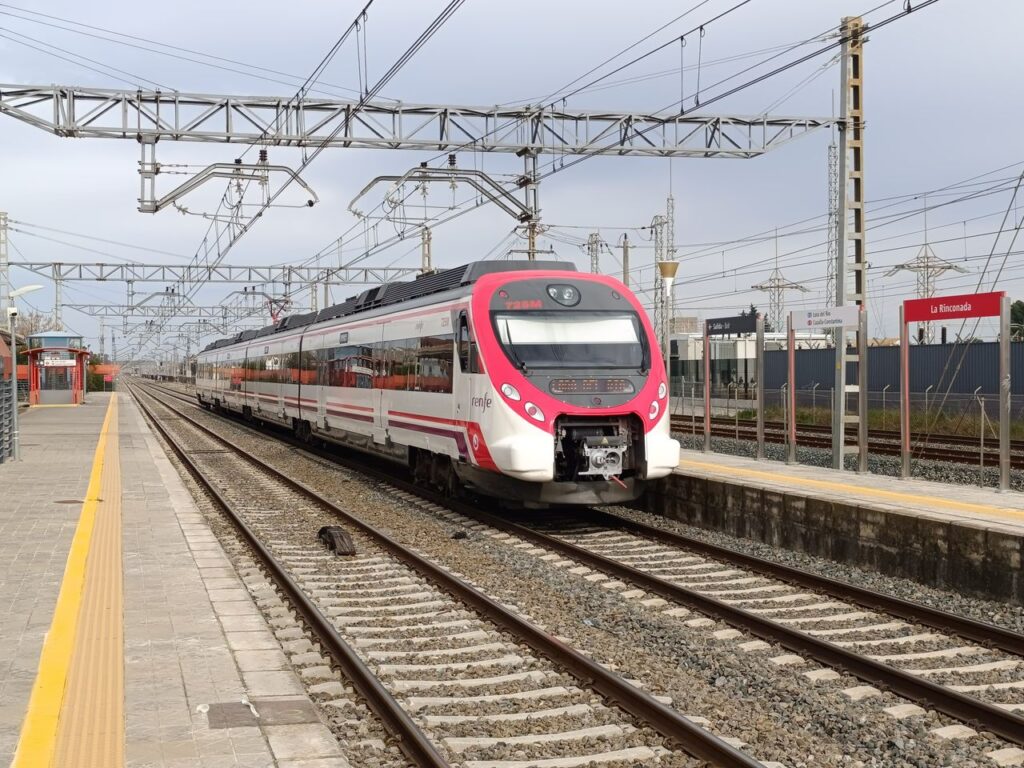 Modern high-speed train at La Rinconada railway station in sunny Andalucía.
